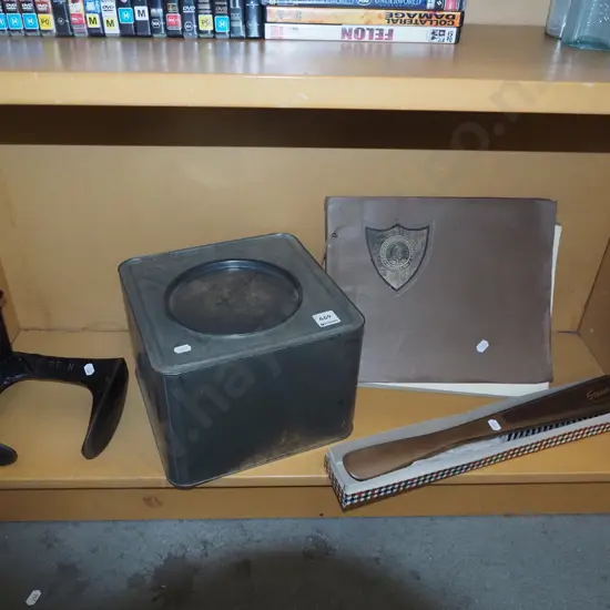 shelf; shoe last, tin, clothes brush etc