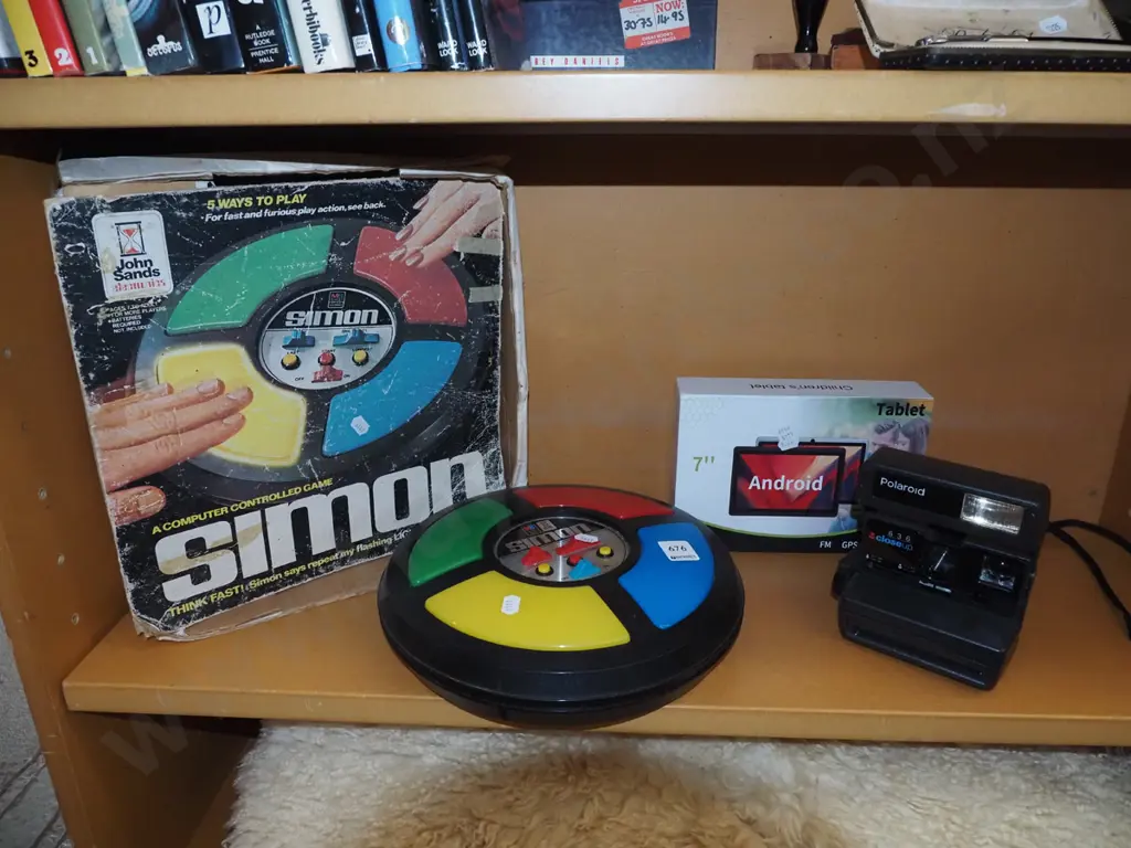 Simon game, android tablet, Polaroid instamatic camera Image 1++
