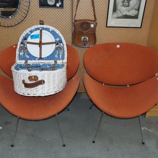 pair of orange upholstered fabric lip reception chairs