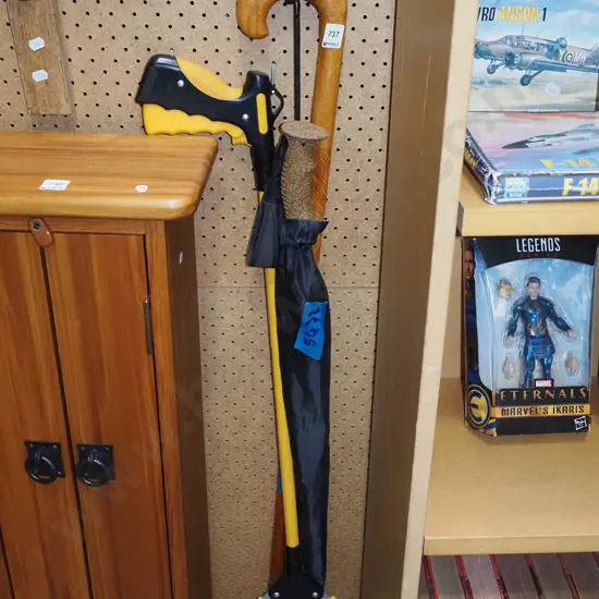 pick up sticks, umbrella, walking stick