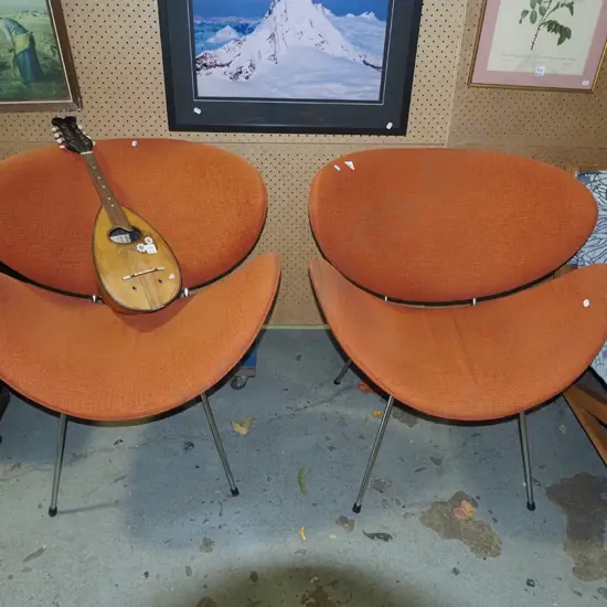 2x orange upholstered lip reception chairs
