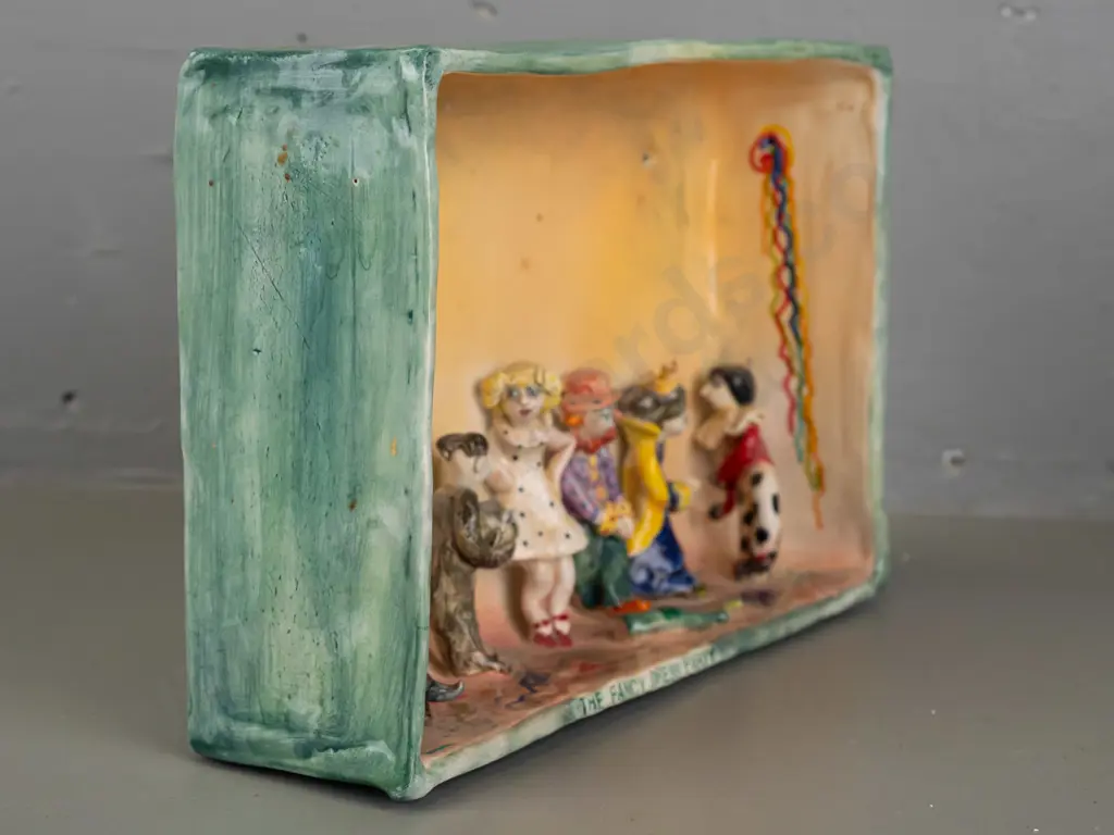 Marion Mewburn - ceramic diorama w/ 5 static figures and 1 figure mounted to spring, "The Fancy Dress Party" Image 1++
