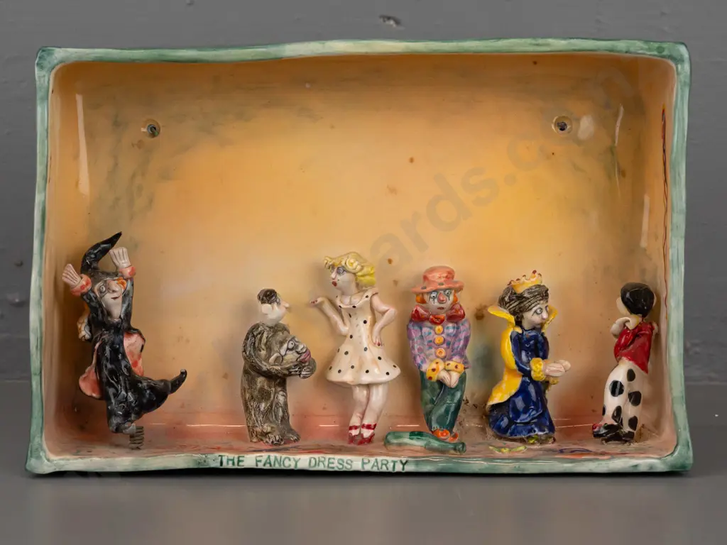 Marion Mewburn - ceramic diorama w/ 5 static figures and 1 figure mounted to spring, "The Fancy Dress Party" Image 1++
