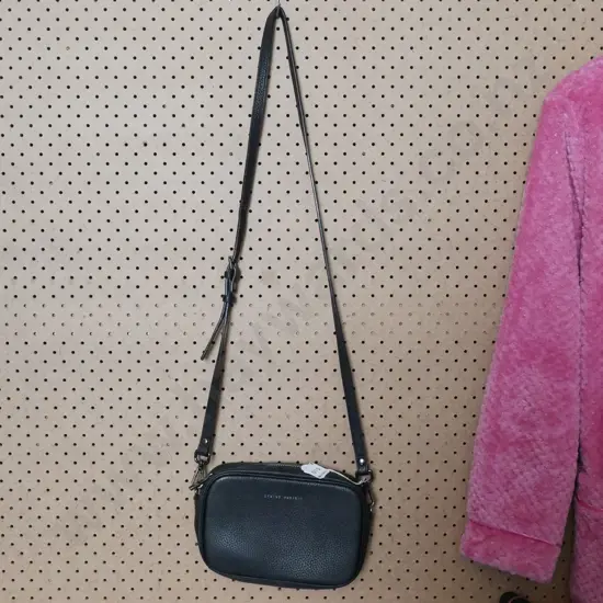 Black status anxiety bag