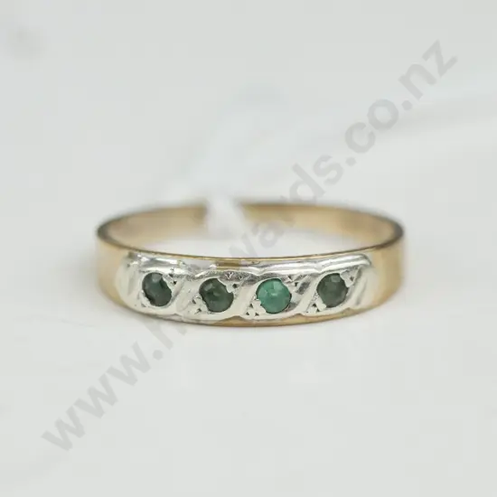 Gold & silver ring with 4 green stones