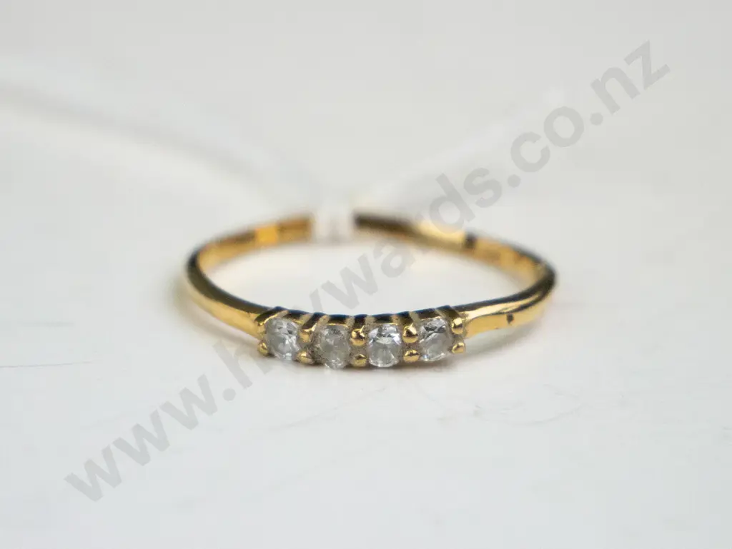 Gold ring with four diamonds. Image 1++