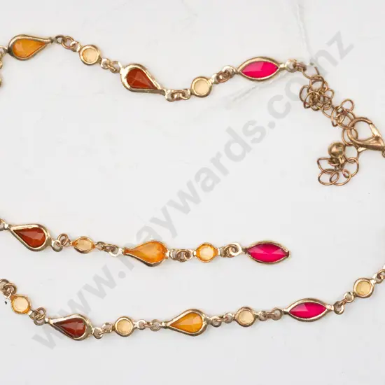 Gold necklace with red/orange droplet shapes, damaged