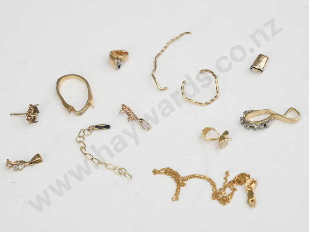 bag of assorted gold items Image 1++