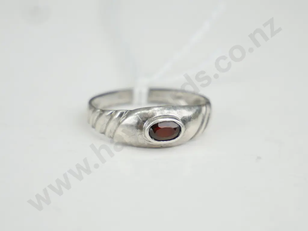 Silver ring with brownish coloured stone Image 1++