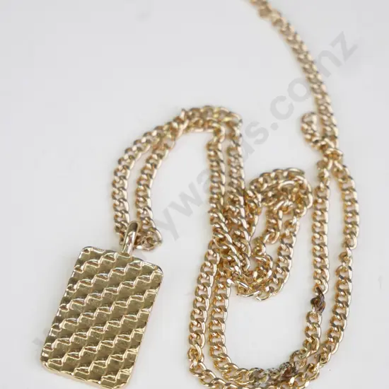 Gold necklace with ""WFTW"" in writing