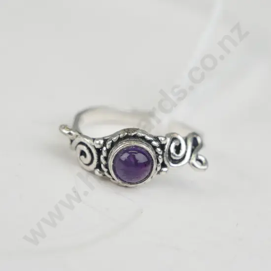 Silver Ring with purple coloured stone damaged