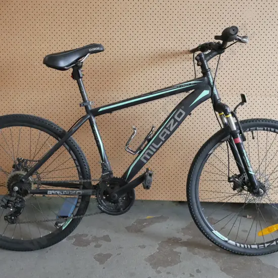 Black/Grey and Green Milazo Bike, damage to gear shifter