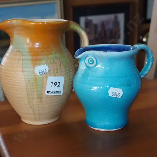 2x milk jugs H150