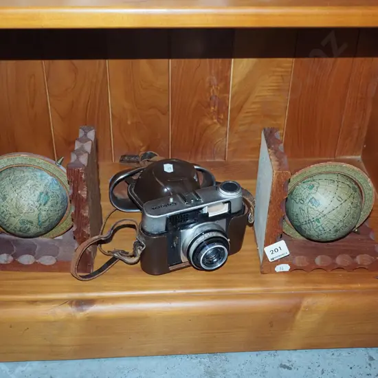 2x globe themed bookends, leather cased Colora 35mm camera