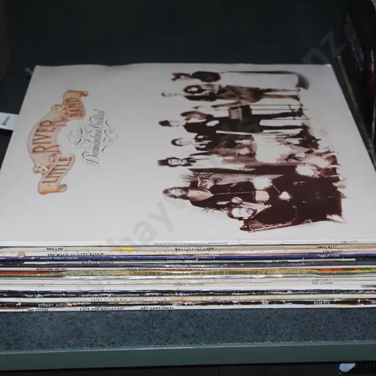 stack of LPs: Bay City Rollers, Little River Band etc