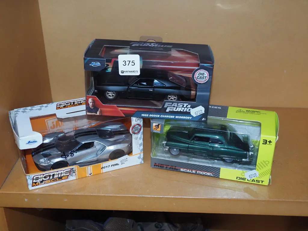 3x boxed diescast model vehicles Image 1++
