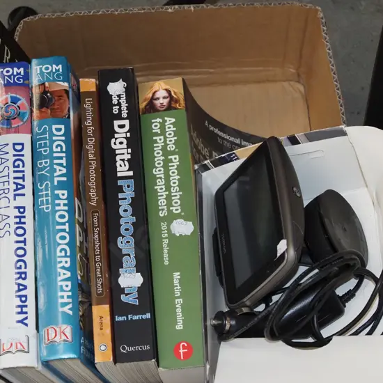 box; photography books, tom tom car navigation system