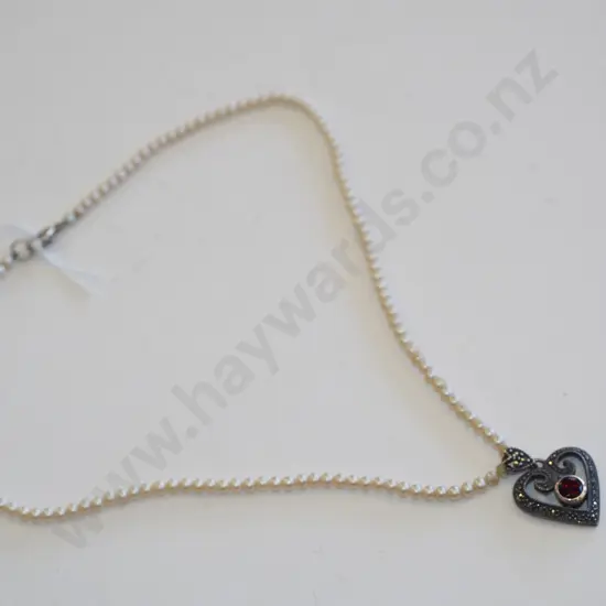 sterling silver and garnet pendant with seed pearl necklace