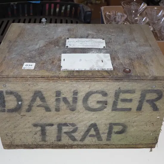 wooden and metal animal trap