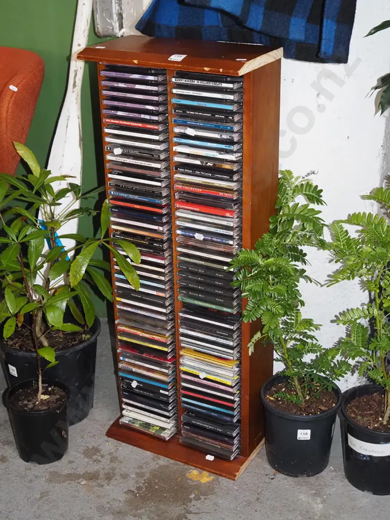 CD tower and CDs - edges have been cut H840 Image 1++
