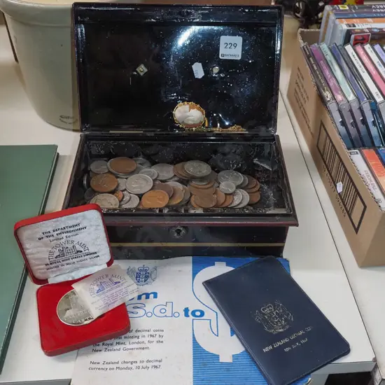 cash box with coins, cameo pendant
