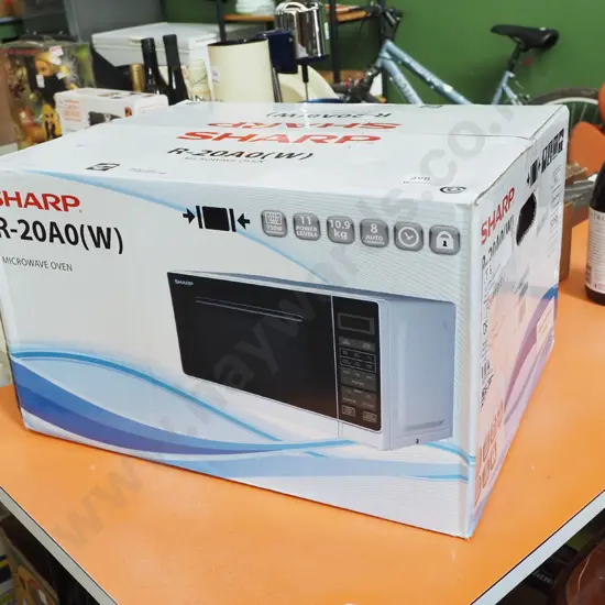 boxed as new Sharp microwavwe