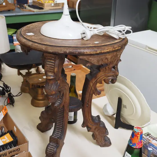 heavily carved wooden wine table H600 Diam440 - varnish needs attention