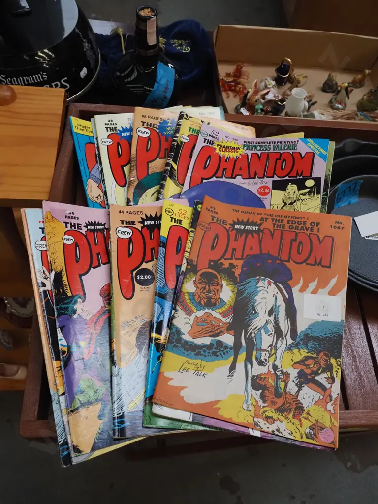 stack of Phantom comics Image 1++