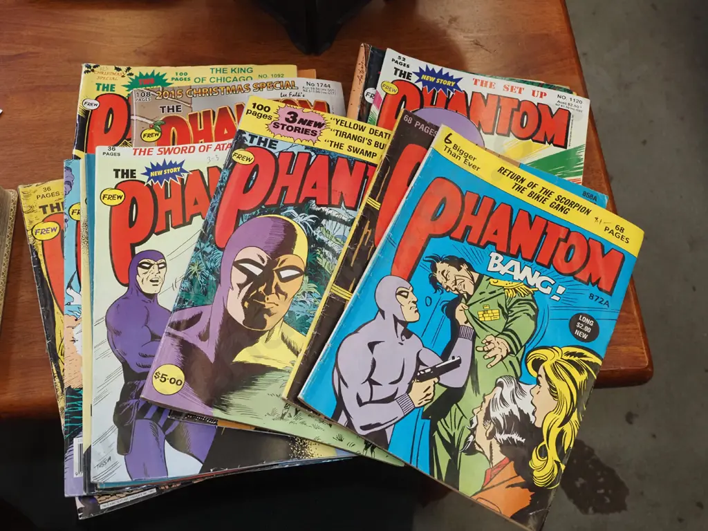 stack of Phantom comics Image 1++