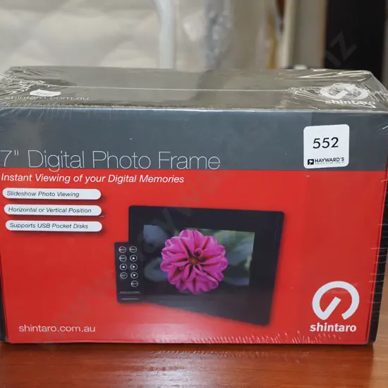 boxed as new 7" digital photo frame