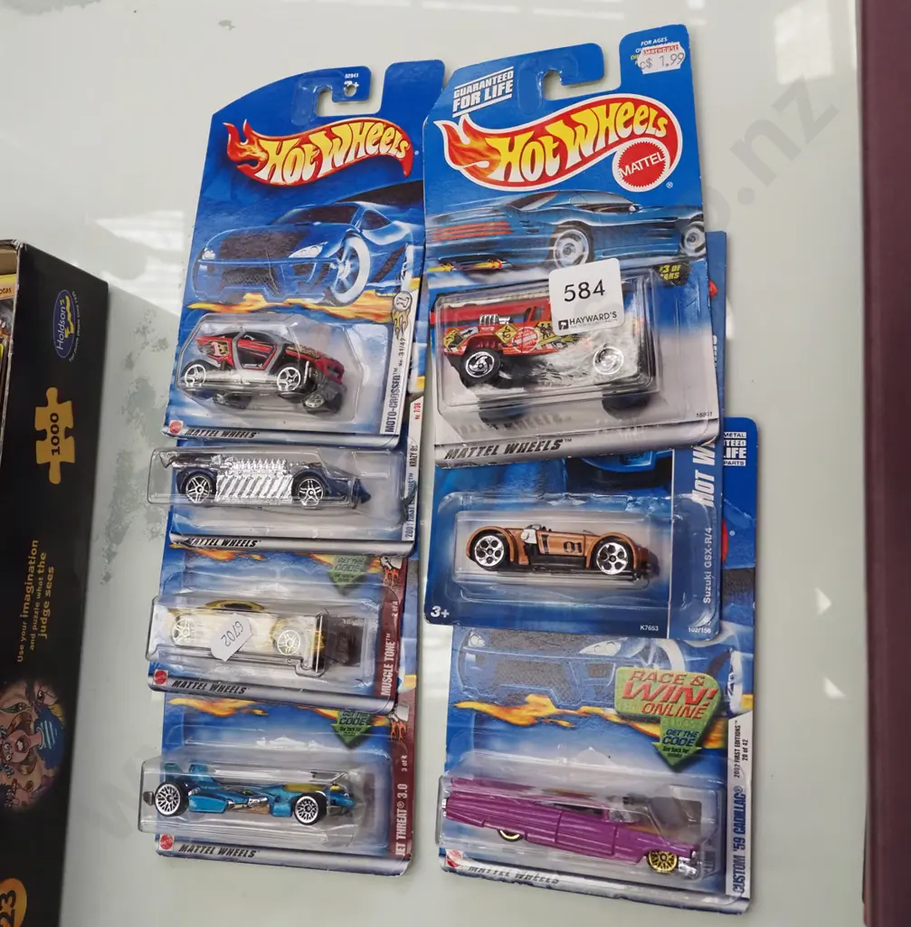 7x as new carded Hotwheels vehicles Image 1++
