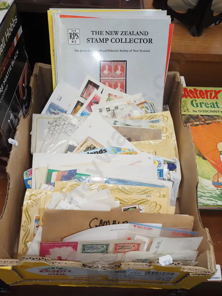 box of stamps and stamp reference books Image 1++