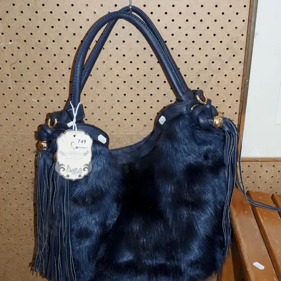faux fur blue hand bag