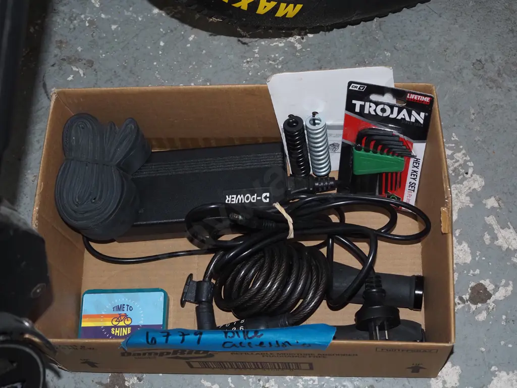 Watt Wheels electric bike with box of accessories including chargers and cables Image 1++
