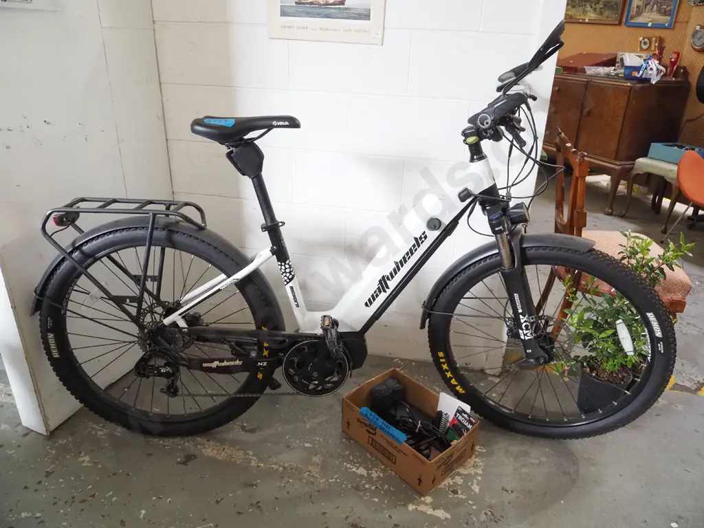 Watt Wheels electric bike with box of accessories including chargers and cables Image 1++