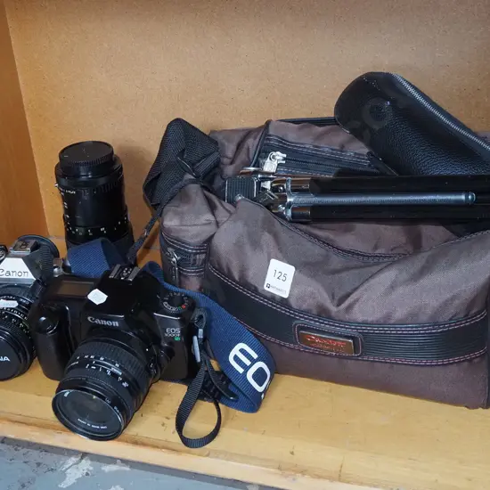 Canon AE-1 and Canon EOS 1000F 35mm SLR film cameras, additional lens, tripod & carry bag