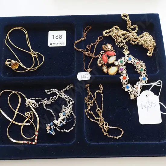 tray of assorted necklaces