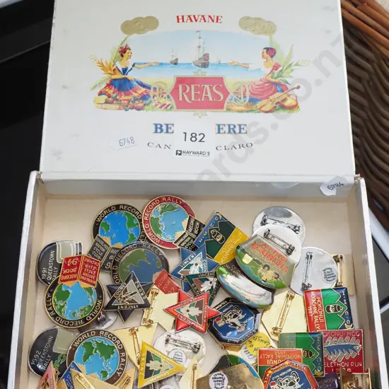 tray of various badges