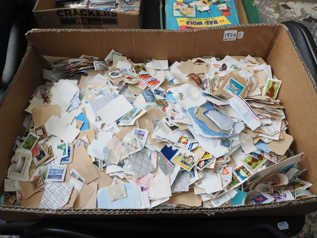 box of loose postage stamps Image 1++
