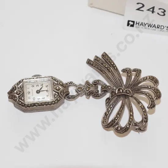 cz brooch and watch