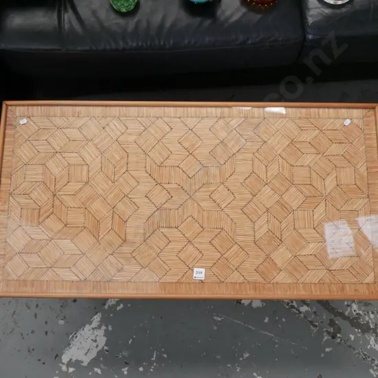 matchstick and glass top coffee table