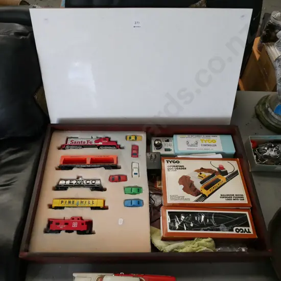 homemade wooden case with Tyco train set, controller, carriages and cars