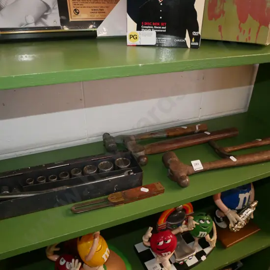 shelf; hammers, socket set, angle finder