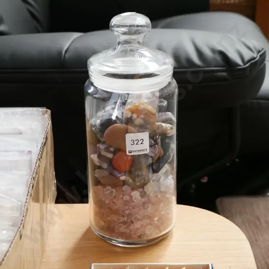 lidded glass storage canisters, stones