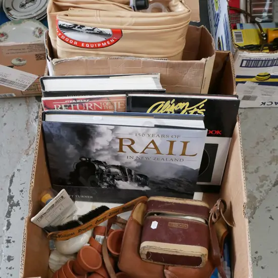 box; air bed, books, tiny terracotta planters etc