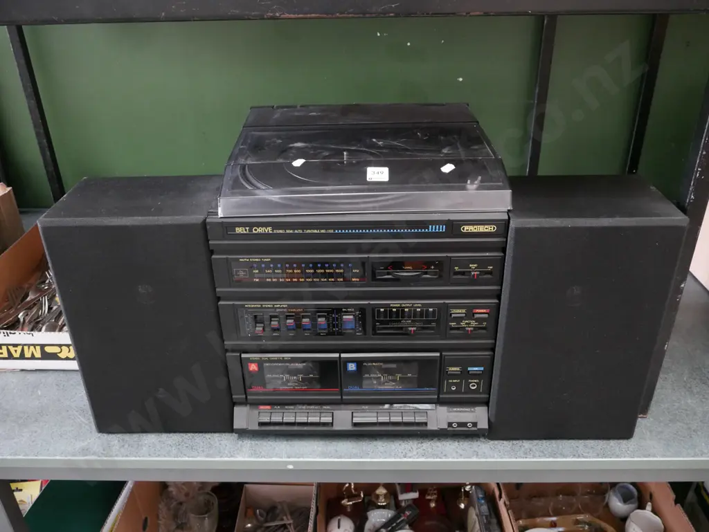 Protech stereo system; twin cassette, radio tuner, turntable - top of turntable cover needs attention Image 1++