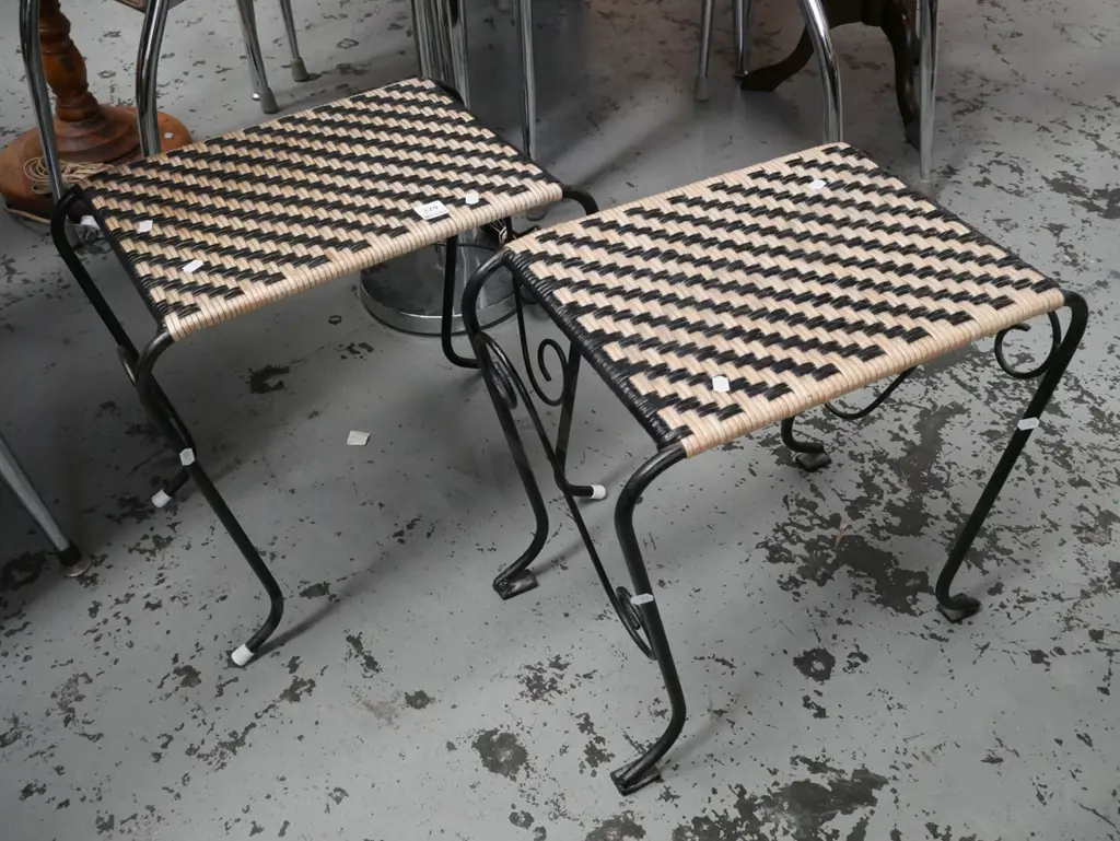 pair of wrought metal and woven plastic stools Image 1++