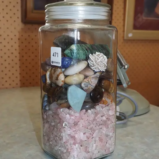 glass lidded container; polished and other stones