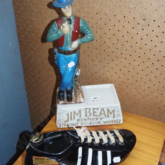 part Jim Beam cowboy decanter, French brandy rugby boot decanter - both empty