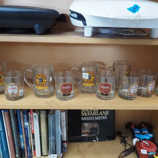shelf; branded whisky tumblers, beer mugs
